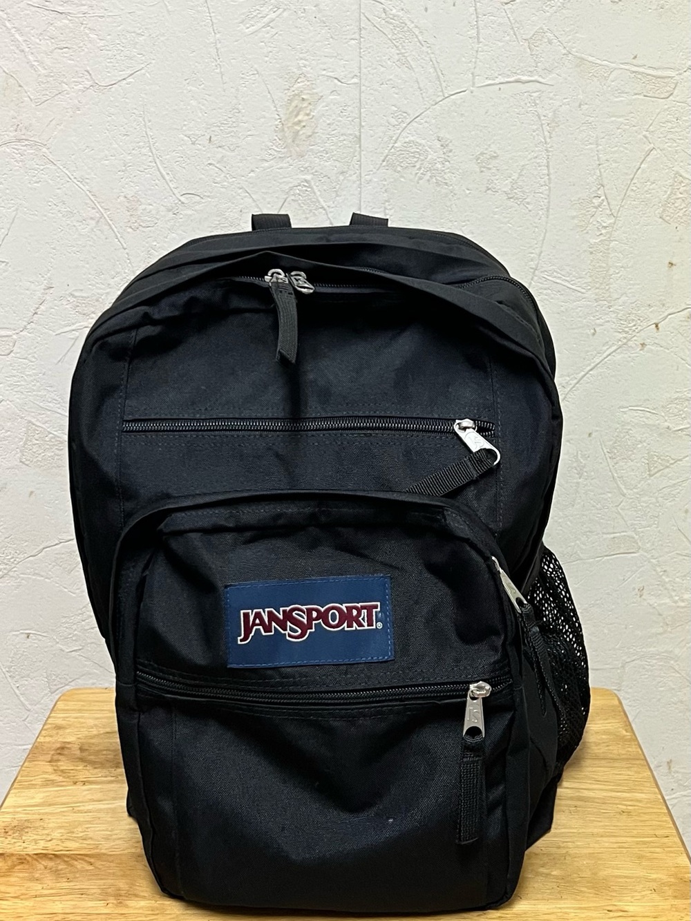 JanSport Big Student Backpack features 15" padded laptop compartment.